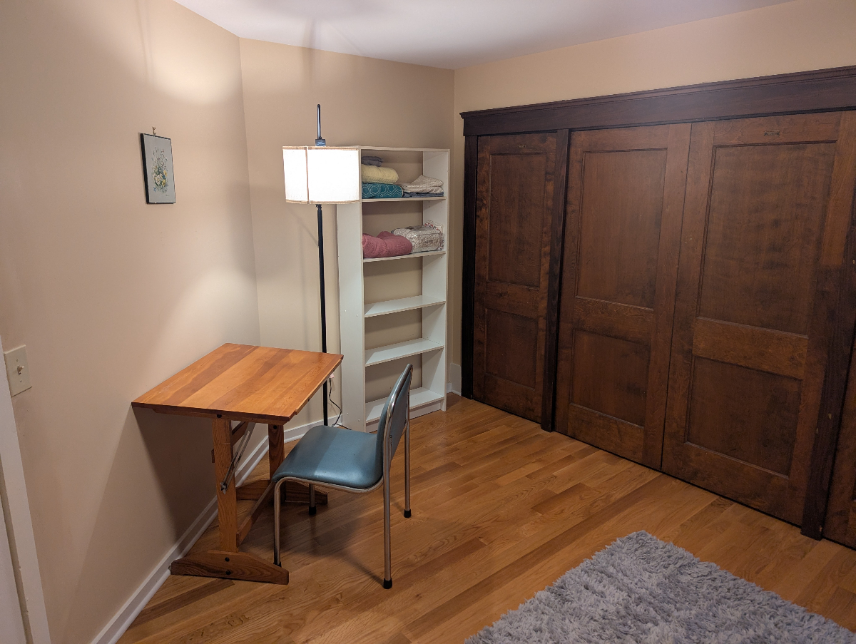 Primary Furnished Bedroom in 2 Bedroom Unit, wood floors, lots of closet space, off-street parking! - Photo 2