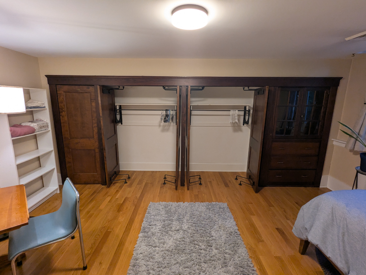 Primary Furnished Bedroom in 2 Bedroom Unit, wood floors, lots of closet space, off-street parking! - Photo 4