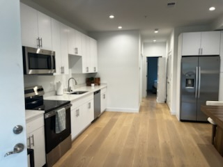 Beautiful New 2-Bedroom Apartment Duplex In Top Location Near Hospitals and Parks - Photo 2
