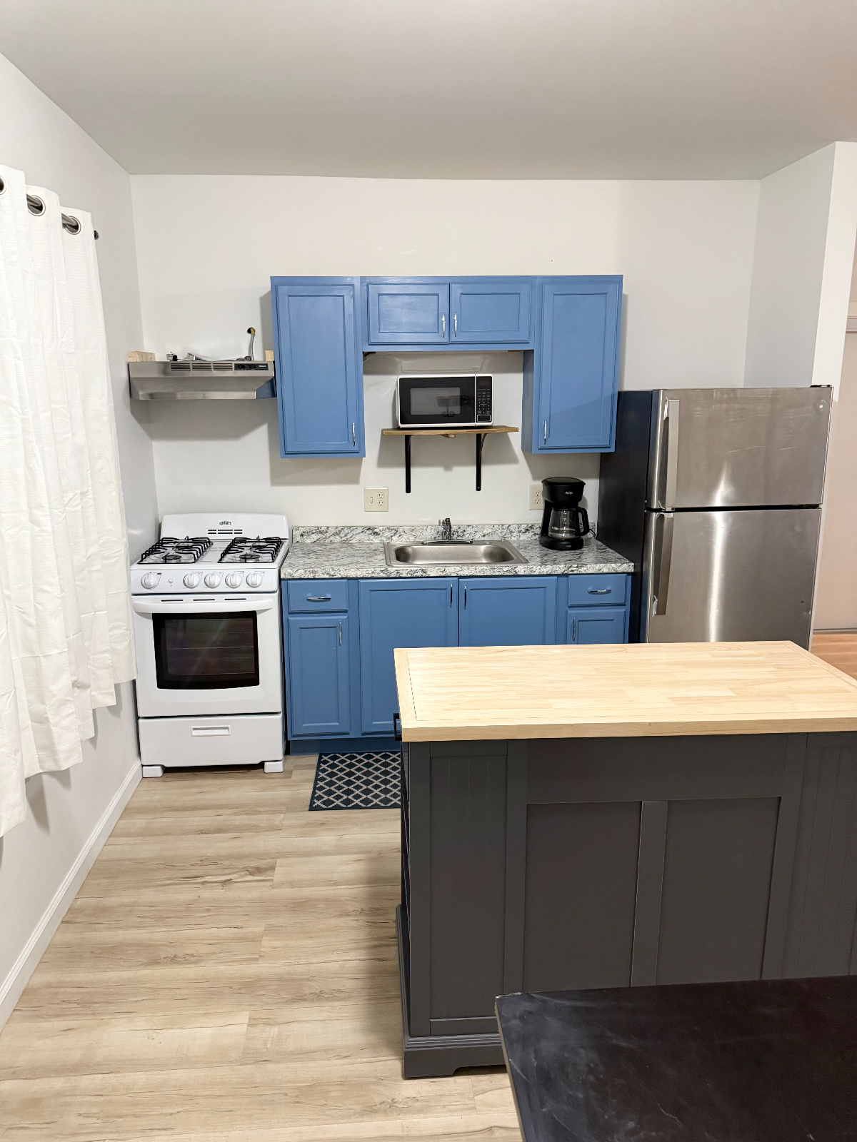 Furnished 2BR on Elmwood-  Walk to Target, Coffee, and Kenmore Mercy - Photo 12