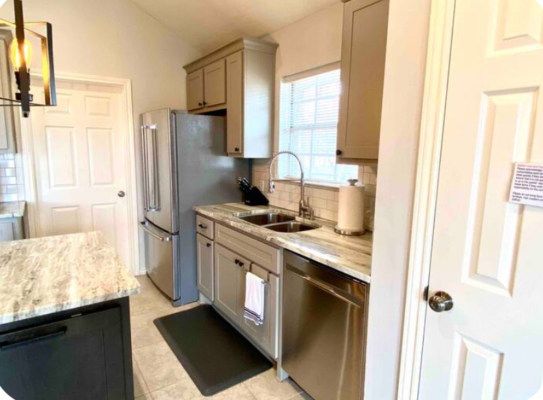 Close to everything, 3/2 single family home, fenced backyard - Photo 12