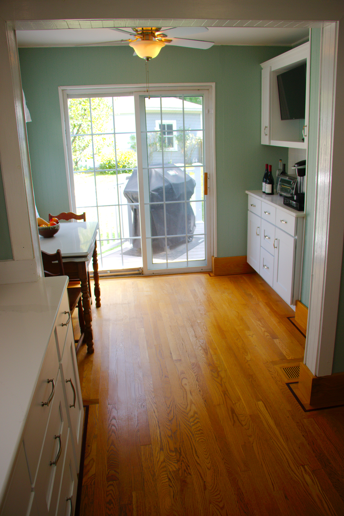 Comfortable Two-Bedroom Home with Backyard, Deck, and Off-Street Parking - Photo 8