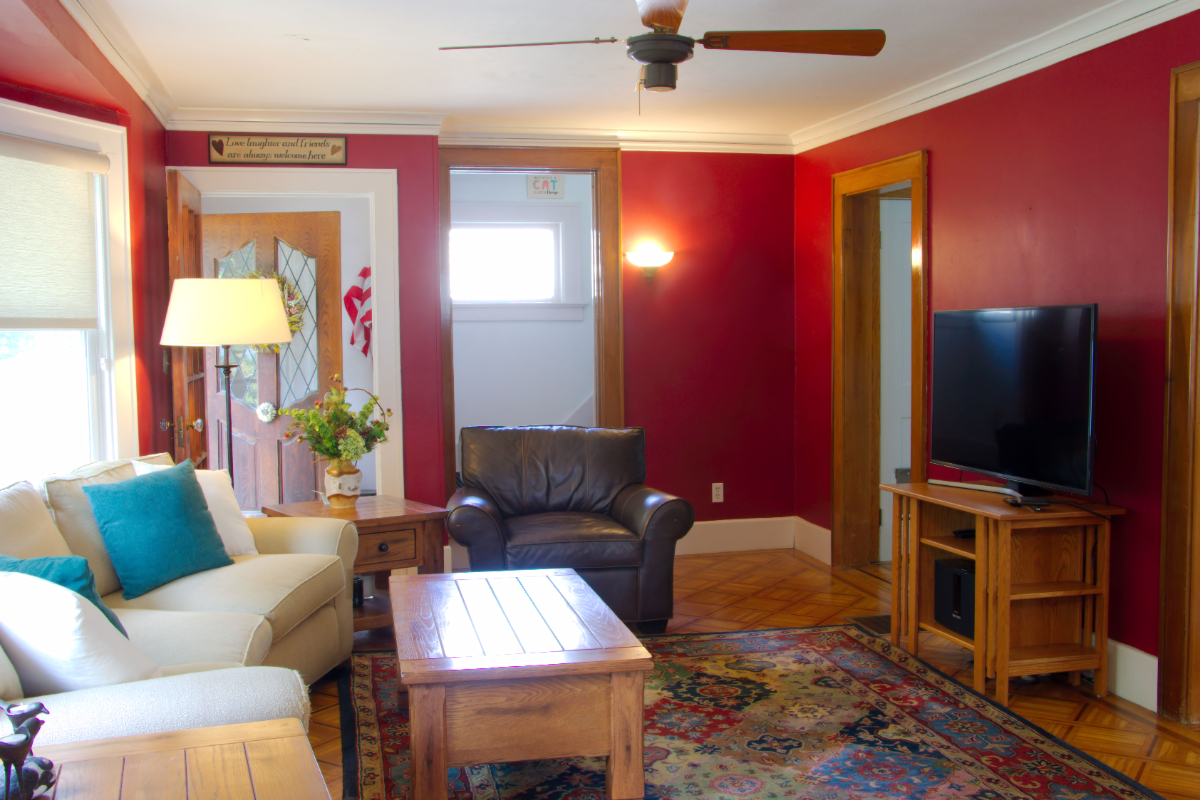 Comfortable Two-Bedroom Home with Backyard, Deck, and Off-Street Parking - Photo 5