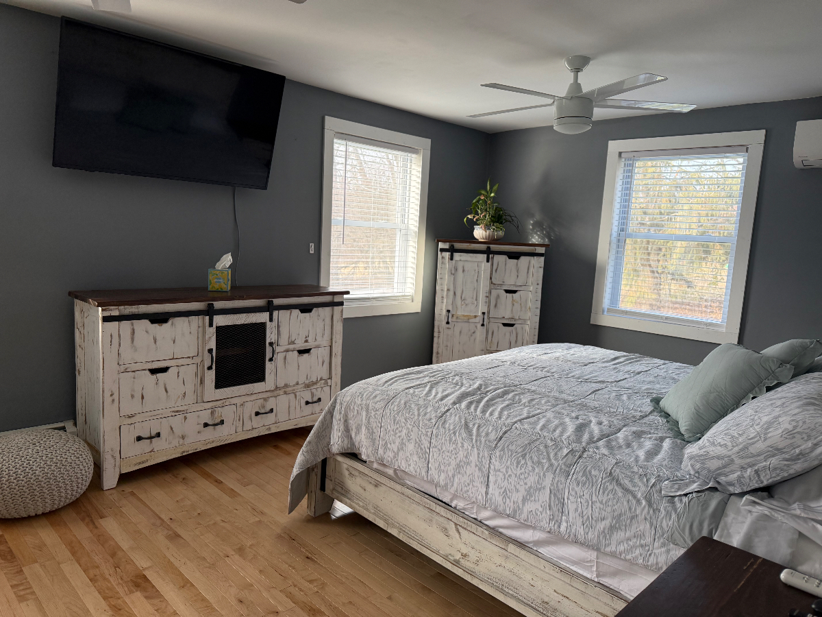 Spacious 4-Bed Home on 2 Acres with Trails, Deck, and Modern Kitchen. - Photo 6
