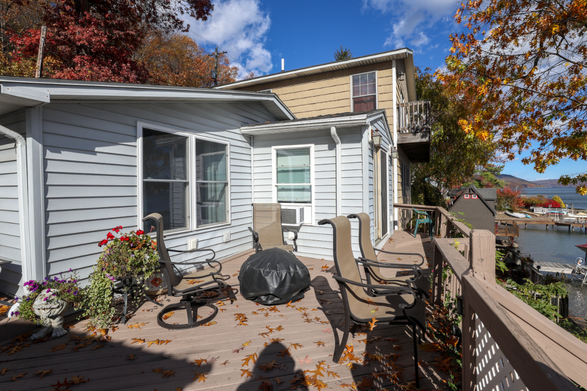 Cozy Lakefront Cottage with Deck, Dock & All Utilities Included - Photo 1