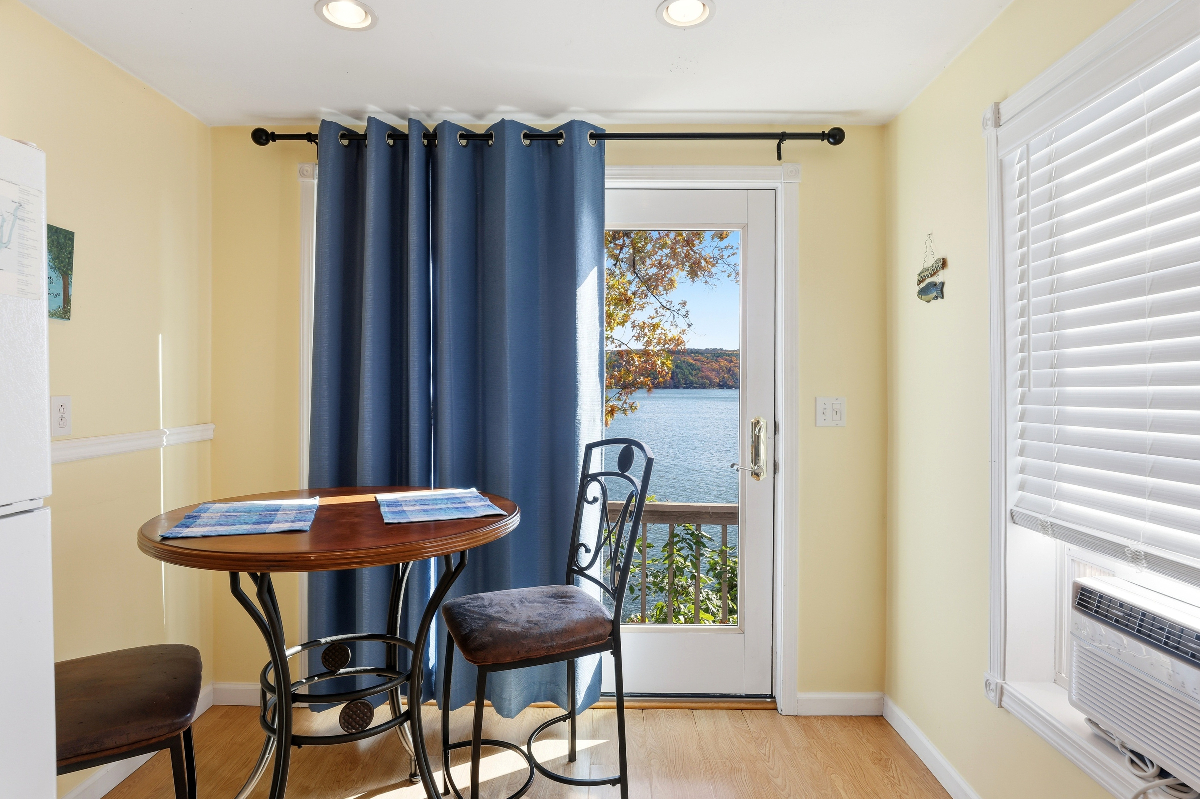 Cozy Lakefront Cottage with Deck, Dock & All Utilities Included - Photo 4