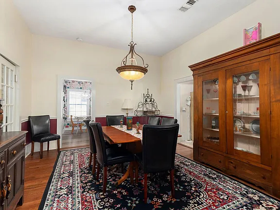 Charming 3-Bedroom Home with Fireplace, Screened Porch, and Huge Backyard - Photo 9