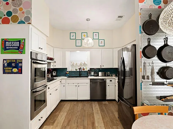 Charming 3-Bedroom Home with Fireplace, Screened Porch, and Huge Backyard - Photo 11