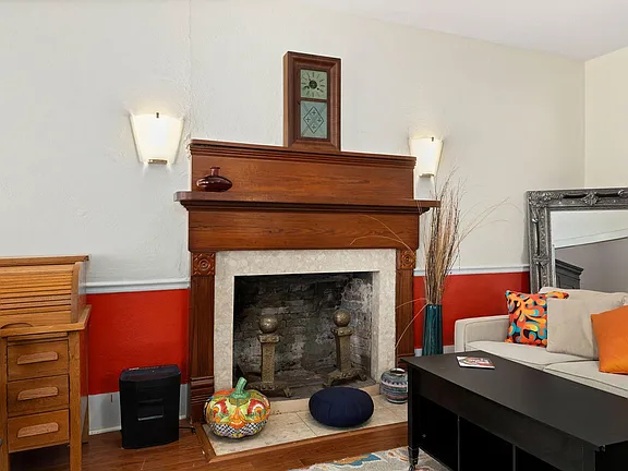 Charming 3-Bedroom Home with Fireplace, Screened Porch, and Huge Backyard - Photo 6