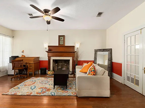 Charming 3-Bedroom Home with Fireplace, Screened Porch, and Huge Backyard - Photo 7