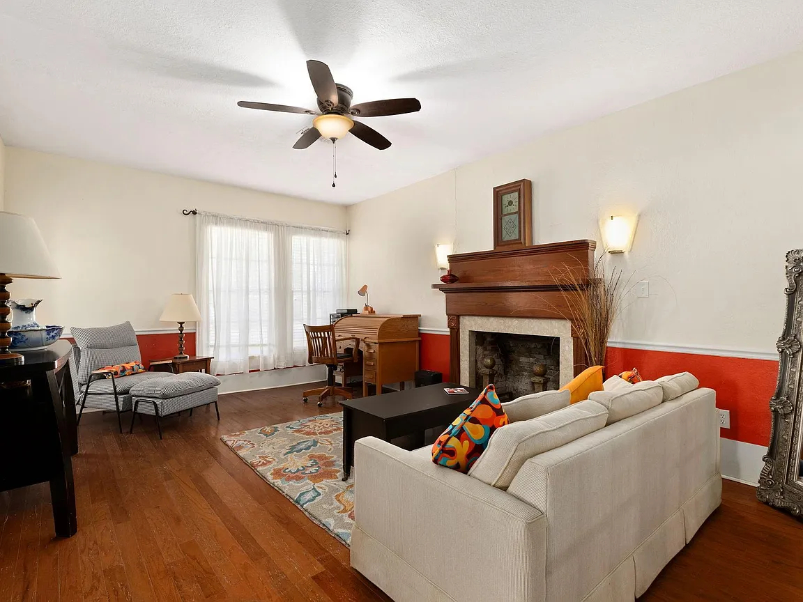 Charming 3-Bedroom Home with Fireplace, Screened Porch, and Huge Backyard - Photo 8