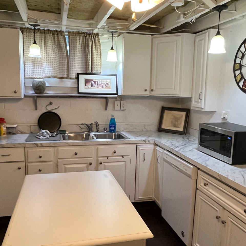 Charming Basement Apartment -- Fully Furnished with Utilities Included, Garage Parking & Shared Outd - Photo 2