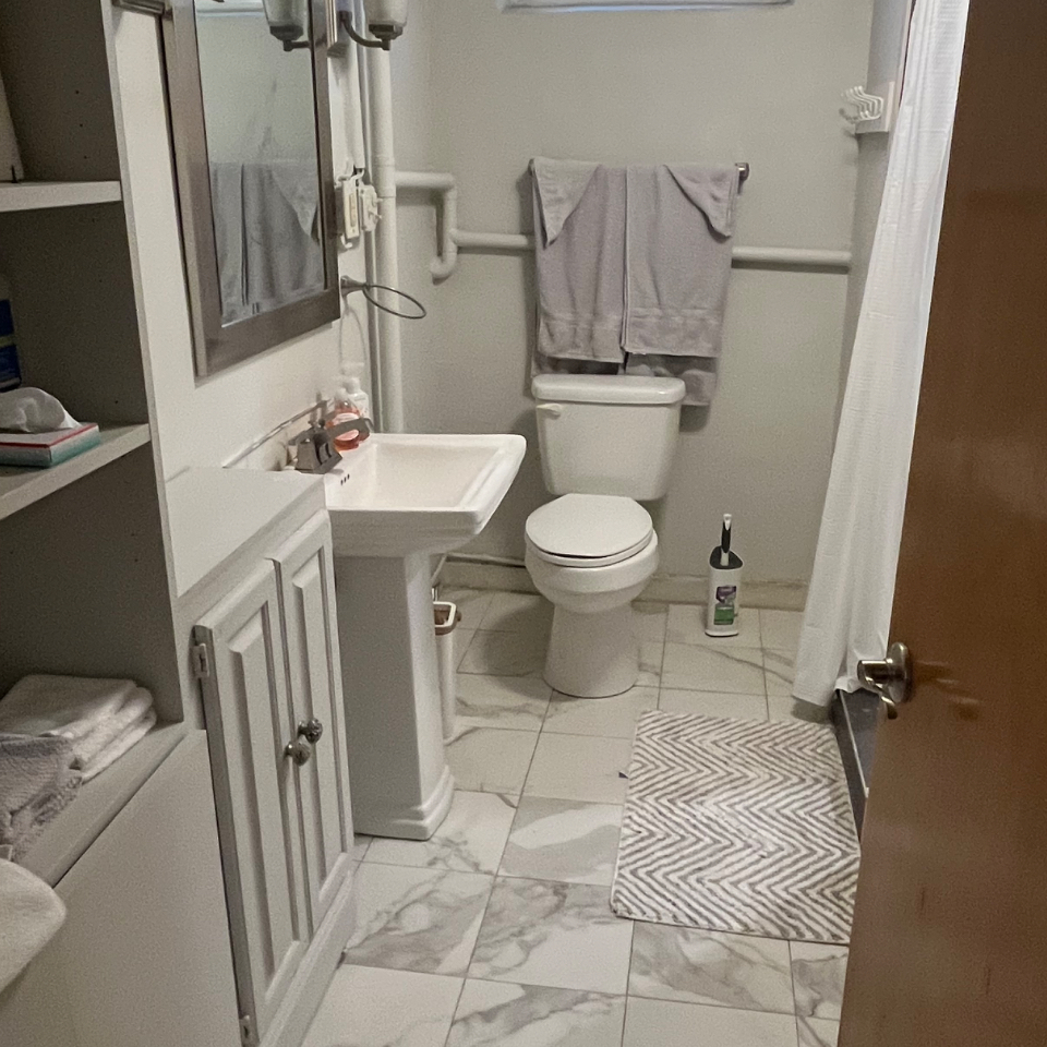 Charming Basement Apartment -- Fully Furnished with Utilities Included, Garage Parking & Shared Outd - Photo 12