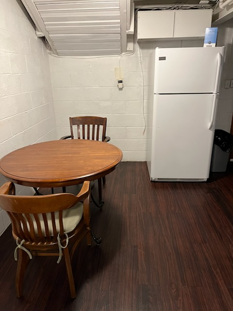 Charming Basement Apartment -- Fully Furnished with Utilities Included, Garage Parking & Shared Outd - Photo 1