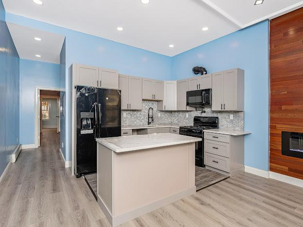 Updated First-Floor Apartment with Modern Finishes & Open Layout -- Albany's Prime Location - Photo 1
