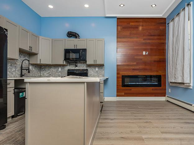 Updated First-Floor Apartment with Modern Finishes & Open Layout -- Albany's Prime Location - Photo 3