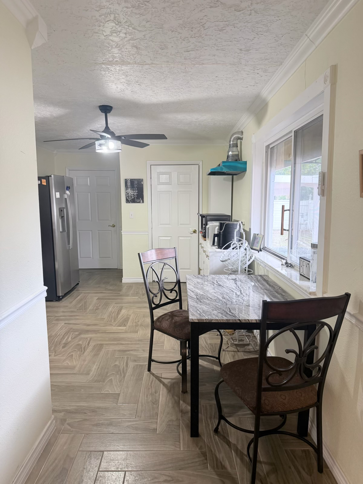 One bedroom with private bathroom. Common kitchen with washer and dryer. $850.00 a month with all bi - Photo 7