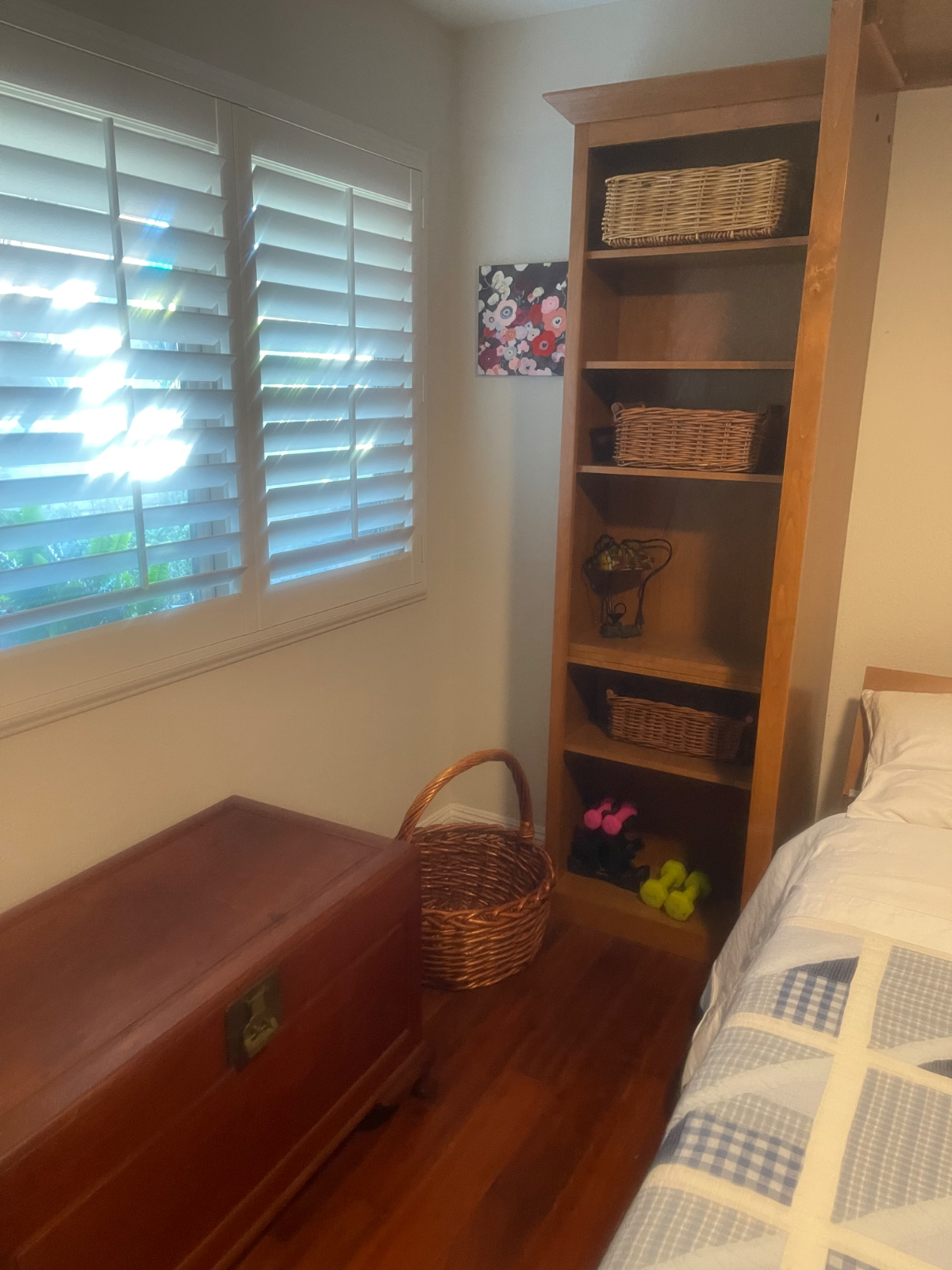 Room with queen bed and bathroom