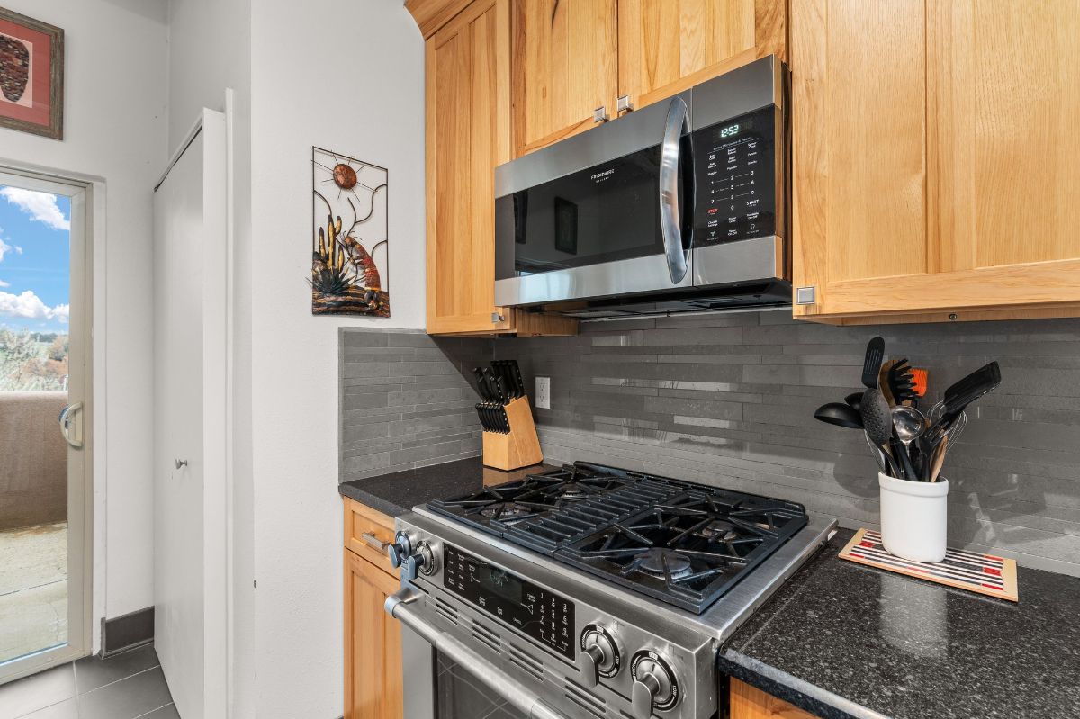 Artistic Condo Near Plaza with Views - Photo 10