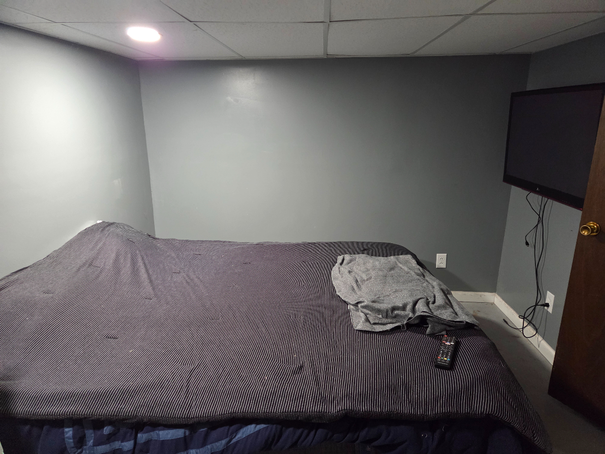 Spacious Basement Apartment with Utilities Included & Driveway Parking -- Safe & Quiet Neighborhood - Photo 4