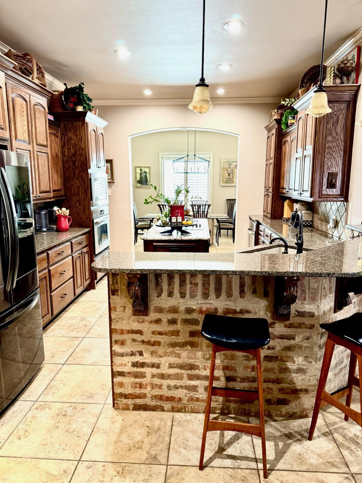 Spacious 3BR-Den Home with Dual Suites, Outdoor Fireplace, Gazebo & 2-Car Garage - Photo 8