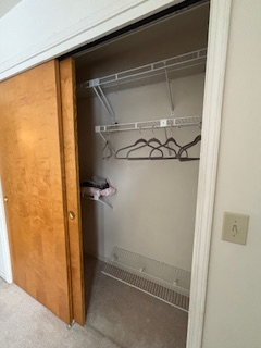 Comfortable end unit two-bedroom condo with garage, sunroom, and community pool access - Photo 10