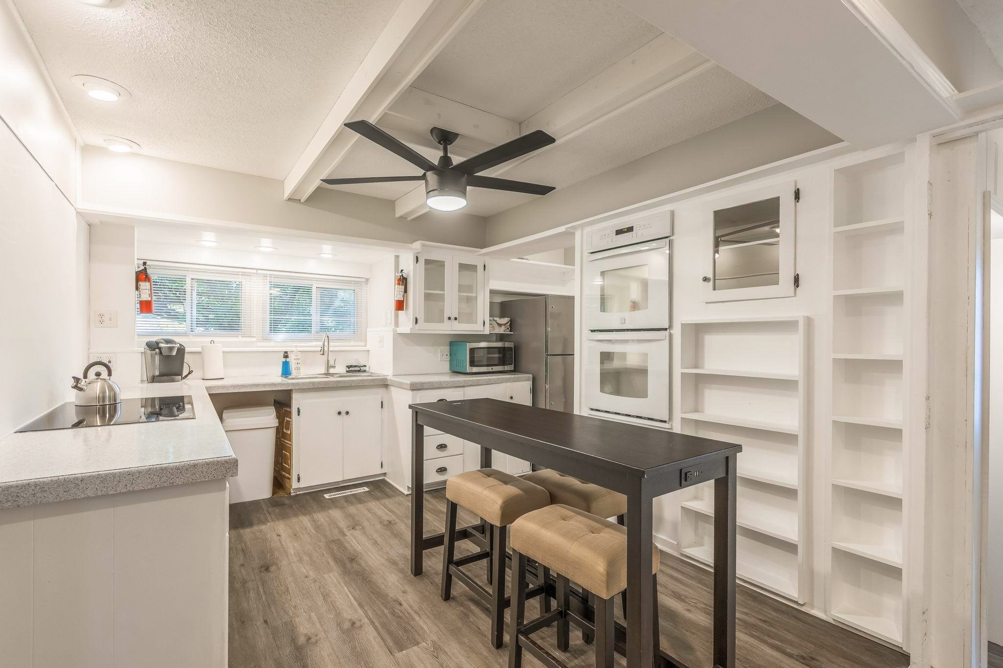 Discover this stylish home in Raytown, just minutes from 63rd St, Raytown Rd, major hospitals, employers like Hallmark and Cerner, and vibra
