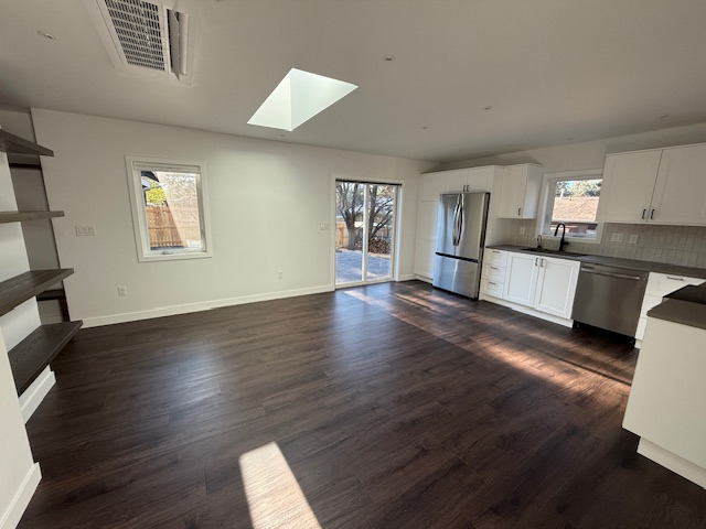 Charming 2-Bedroom Retreat with Fenced Backyard and Modern Open Layout -- Quiet & Private Home - Photo 3