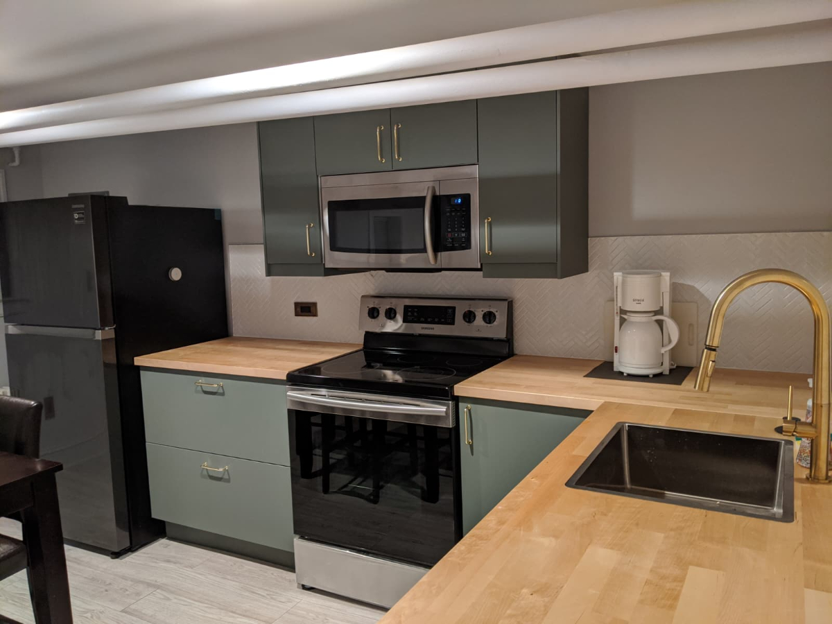 Renovated English Basement - centrally located with parking - Photo 7