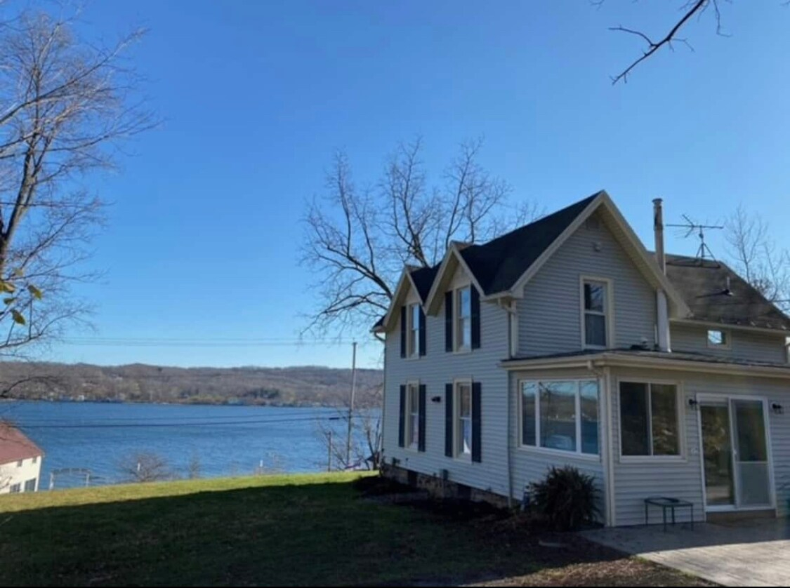 Quiet Geneseo lake property with lots of land and space - Photo 2